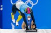 Vladyslav Heraskevych, of Ukraine, starts the men's skeleton run 3 at the 2022 Winter Olympics, Friday, Feb. 11, 2022, in the Yanqing district of Beijing. (AP Photo/Mark Schiefelbein)