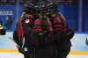 Canada's Sarah Fillier (10) celebrates a goal with teammates during a women's quarterfinal hockey game against Sweden at the 2022 Winter Olympics, in Beijing, Friday, Feb. 11, 2022. THE CANADIAN PRESS/AP-Petr David Josek
