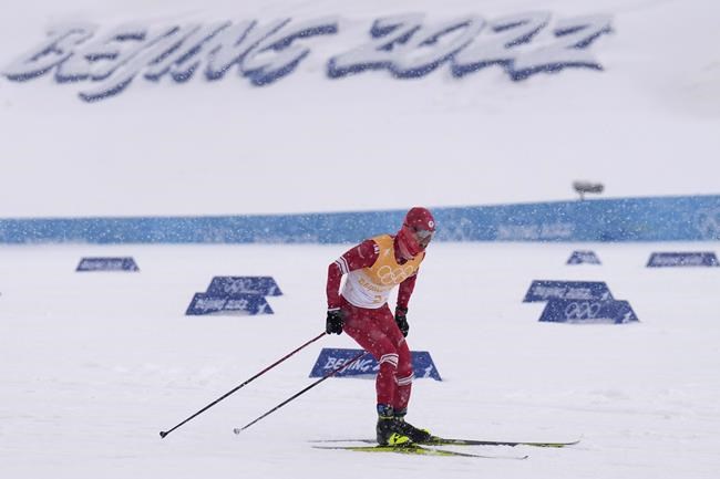 Denis Spitsov, of the Russian Olympic Committee, competes during the men's 4 x 10km relay cross-country skiing competition at the 2022 Winter Olympics, Sunday, Feb. 13, 2022, in Zhangjiakou, China. (AP Photo/Alessandra Tarantino)