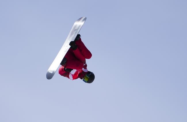 Canada's Max Parrot, of Bromont, Que., makes his way to gold in the men's slopestyle final at the Beijing Winter Olympic Games, in Zhangjiakou, China, Monday, Feb. 7, 2022. THE CANADIAN PRESS/Sean Kilpatrick