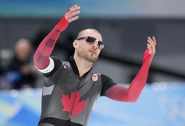Canada's Laurent Dubreuil reacts after skating in the men's 500 metre speedskating competition at the 2022 Winter Olympics in Beijing on Saturday, February 12, 2022. THE CANADIAN PRESS/Paul Chiasson