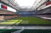 FILE - This Sunday, March 8, 2020 file photo shows the empty stadium during the Serie A soccer match between AC Milan and Genoa at the San Siro stadium, in Milan, Italy. The opening ceremony for the 2026 Winter Olympics will be held at the current San Siro stadium, Milan Mayor Giuseppe Sala announced Friday Oct. 29, 2021. (AP Photo/Antonio Calanni, File)