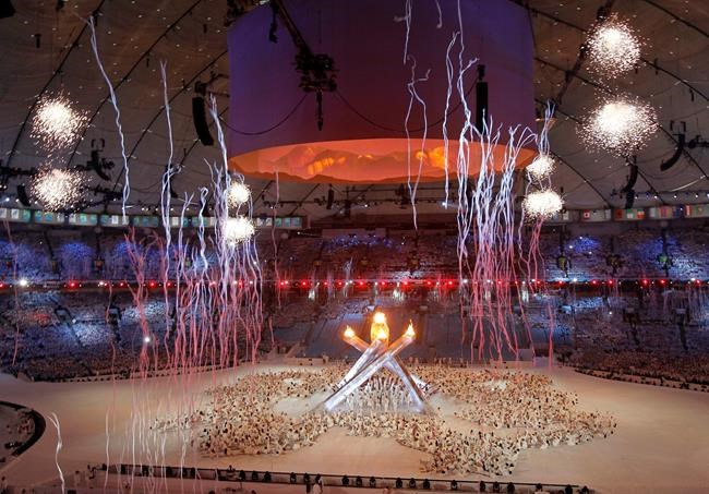 Fireworks go off during the 2010 Vancouver Olympic Winter Games closing ceremonies on Sunday, Feb. 28, 2010 at B.C. Place in Vancouver. THE CANADIAN PRESS/Nathan Denette