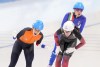 Gold medallist Irene Schouten, left, of the Netherlands, celebrates after crossing the finish line ahead of silver medallist Ivanie Blondin, of Canada, and bronze medalist Francesca Lollobrigida, of Italy, in the women's mass start speedskating final at the 2022 Winter Olympics in Beijing on Saturday, February 19, 2022. THE CANADIAN PRESS/Paul Chiasson
