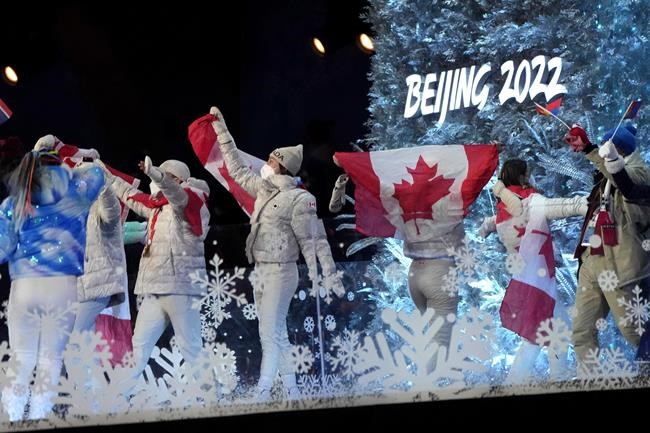 Athletes from Canada march into the stadium during the closing ceremony of the 2022 Winter Olympics, Sunday, Feb. 20, 2022, in Beijing. THE CANADIAN PRESS/AP-Natacha Pisarenko