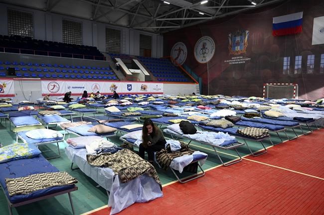 Displaced civilians from the Donetsk and Luhansk regions, the territory controlled by pro-Russia separatist governments in eastern Ukraine, rest in a sport hall in Taganrog, Russia, Monday, Feb. 21, 2022. World leaders are making another diplomatic push in hopes of preventing a Russian invasion of Ukraine, even as heavy shelling continues in Ukraine's east. (AP Photo)