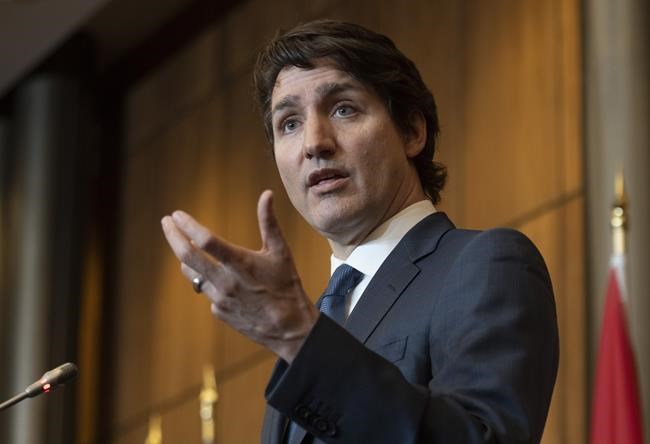 Canadian Prime Minister Justin Trudeau responds to a question during a news conference, Monday, February 21, 2022 in Ottawa. THE CANADIAN PRESS/Adrian Wyld