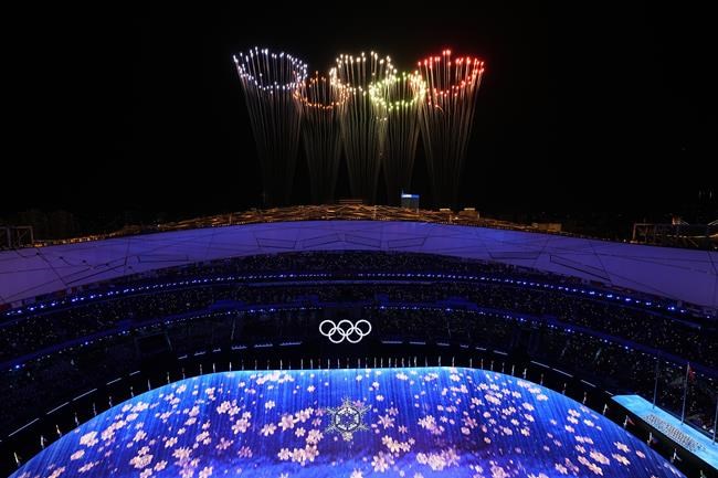 Fireworks light up the sky over Olympic Stadium during the closing ceremony of the 2022 Winter Olympics, Sunday, Feb. 20, 2022, in Beijing. (AP Photo/Jeff Roberson)