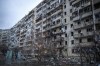 View of a building damaged following a rocket attack the city of Kyiv, Ukraine, Friday, Feb. 25, 2022. (AP Photo/Emilio Morenatti)