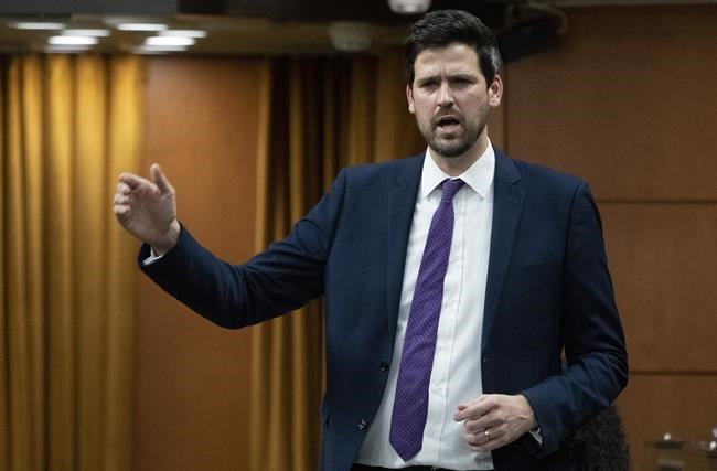 Minister of Immigration, Refugees and Citizenship Sean Fraser rises during Question Period, in Ottawa, Thursday, Feb. 17, 2022. Fraser announced last week the government would allow Ukrainians who have fled Russian aggression to come to Canada temporarily for a period of two years,