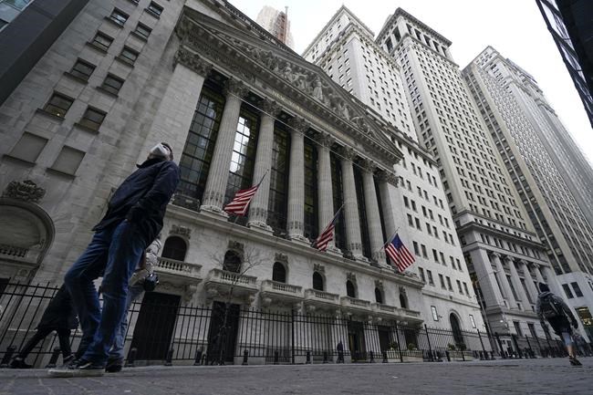 FILE - The New York Stock Exchange is seen in New York, Thursday, Feb. 24, 2022. Oil prices are rising sharply again Tuesday, March 8, 2022, as the U.S. prepares to ban crude oil imports from Russia in response to that country's unprovoked invasion of neighboring Ukraine. (AP Photo/Seth Wenig, File)
