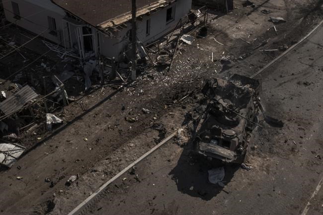 A destroyed Russian tank is seen after battles on a main road near Brovary, north of Kyiv, Ukraine, Thursday, March 10, 2022. McCain Foods will not continue with a project to build production facility in Russia and suspended shipments of its products to the country because of the country's invasion of Ukraine. THE CANADIAN PRESS/AP/Felipe Dana