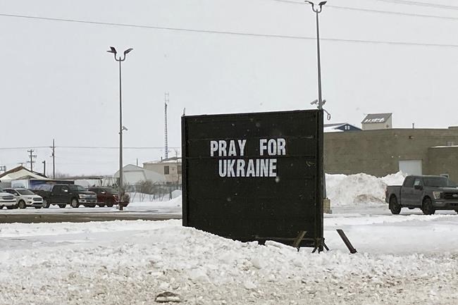 A sign reading,