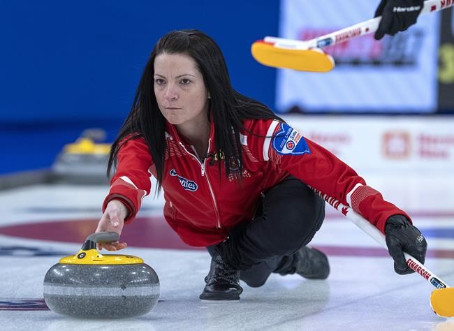 Team Canada skip Kerri Einarson releases a rock as they play Northern Ontario in championship action at the Scotties Tournament of Hearts at Fort William Gardens in Thunder Bay, Ont., Sunday, Feb. 6, 2022. Einarson and Prince George, B.C., are about to get a women’s world curling championship do-over. THE CANADIAN PRESS/Andrew Vaughan