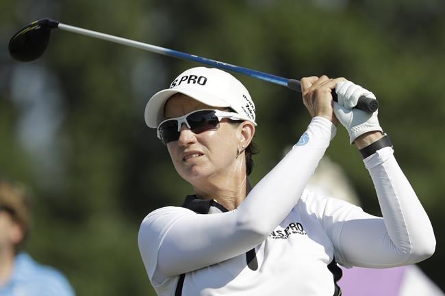 FILE - Karrie Webb of Australia, watches her shot ion the 13th tee during the first round of the U.S. Women's Open golf tournament, onMay 30, 2019, in Charleston, S.C. Seven-time LPGA major winner Webb has been nominated, Friday March 24, 2022, to captain Australia's golfers at the 2024 Paris Olympics. (AP Photo/Steve Helber, File)