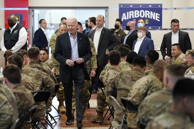 President Joe Biden visits with members of the 82nd Airborne Division at the G2A Arena, Friday, March 25, 2022, in Jasionka, Poland. (AP Photo/Evan Vucci)
