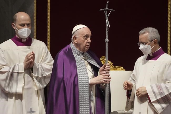 Pope Francis presides over a special prayer in St. Peter's Basilica at the Vatican, Friday, March 25, 2022. Francis is presiding over a special prayer for Ukraine that harks back to a century-old apocalyptic prophesy about peace and Russia that was sparked by purported visions of the Virgin Mary to three peasant children in Fatima, Portugal in 1917. (AP Photo/Gregorio Borgia)