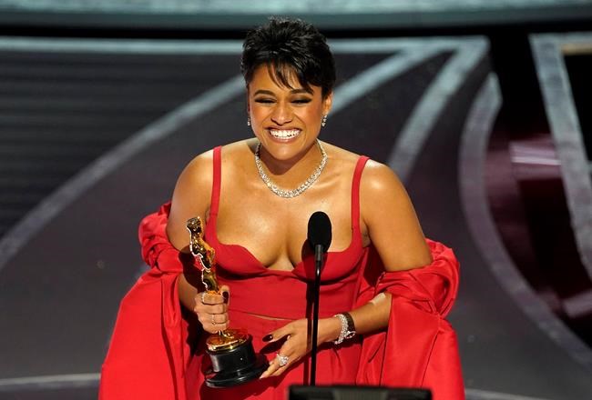 Ariana DeBose accepts the award for best performance by an actress in a supporting role for