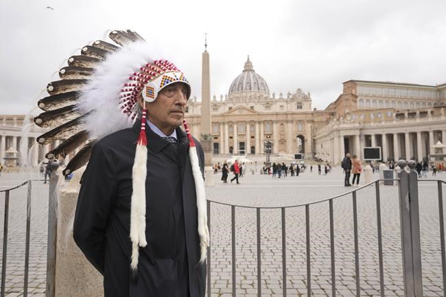 Former national chief of the Assembly of First Nations, Phil Fontaine, stands outside St. Peter's Square at the end of a meeting with Pope Francis at the Vatican, Thursday, March 31, 2022. (AP Photo/Andrew Medichini)