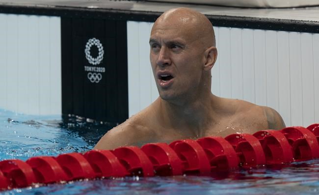 Canada’s Brent Hayden, from Mission, B.C. catches his breath after competing in the 50m freestyle at the Tokyo Olympics, Saturday, July 31, 2021 in Tokyo, Japan. Canadian Olympic swimmer Brent Hayden has retired – again. THE CANADIAN PRESS/Adrian Wyld