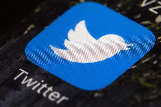 FILE- The Twitter icon is displayed on a mobile phone in Philadelphia on April 26, 2017. Tesla CEO Elon Musk won't be joining Twitter's board of directors as previously announced. The tempestuous billionaire remains Twitter’s largest shareholder. Twitter CEO Parag Agrawal tweeted the news, which followed a weekend of Musk tweets suggesting possible changes to Twitter, including making the site ad-free. Nearly 90% of Twitter's 2021 revenue came from ads. (AP Photo/Matt Rourke, File)