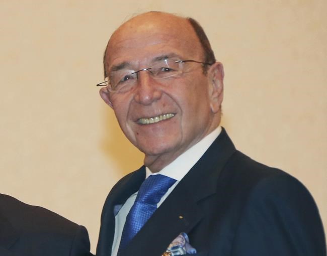 FILE - International Olympic Committee member Alex Gilady of Israel appears during a IOC-Tokyo 2020 1st Project Review session in Tokyo on April 3, 2014. An International Olympic Committee member from Israel who also previously served as a senior vice president of NBC Sports has died. Alex Gilady was 79. The IOC announced Gilady’s death. IOC member John Coates of Australia said Gilady died Wednesday in London. No cause of death was given. (AP Photo/Koji Sasahara, File)