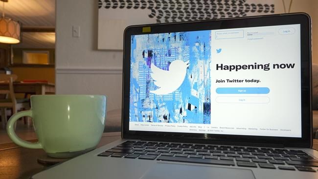 FILE - The login/sign up screen for a Twitter account is seen on a laptop computer Tuesday, April 27, 2021, in Orlando, Fla. Musk is offering to buy Twitter, Thursday, April 14, 2022. He says the social media platform he has criticized for not living up to free speech principles needs to be transformed as a private company. (AP Photo/John Raoux, File)