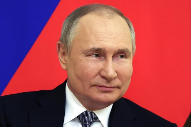 Russian President Vladimir Putin listens to Armenian Prime Minister Nikol Pashinyan during a meeting at the Novo-Ogaryovo residence outside Moscow, Russia, Tuesday, April 19, 2022. The federal government has hit 14 more Russians with sanctions for their close ties with Putin, including his two adult daughters. THE CANADIAN PRESS/Vyacheslav Prokofyev, Sputnik, Kremlin Pool Photo via AP