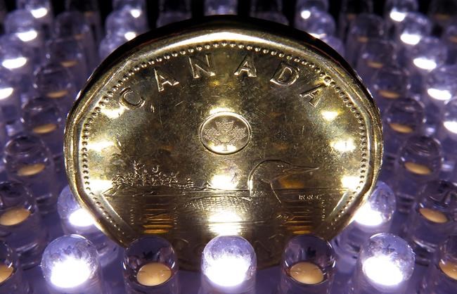 A loonie is pictured in Vancouver on April, 2014.THE CANADIAN PRESS/Jonathan Hayward