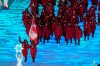 Canada flag-bearers Charles Hamelin (left) and Marie-Philip Poulin waves as they lead the Canadian athletes during the opening ceremony at the Beijing Winter Olympics in Beijing, China, on Friday, Feb. 4, 2022. Hundreds of Canadian athletes, active and retired, are cataloguing the ways in which the national high-performance system has failed them. THE CANADIAN PRESS/Paul Chiasson