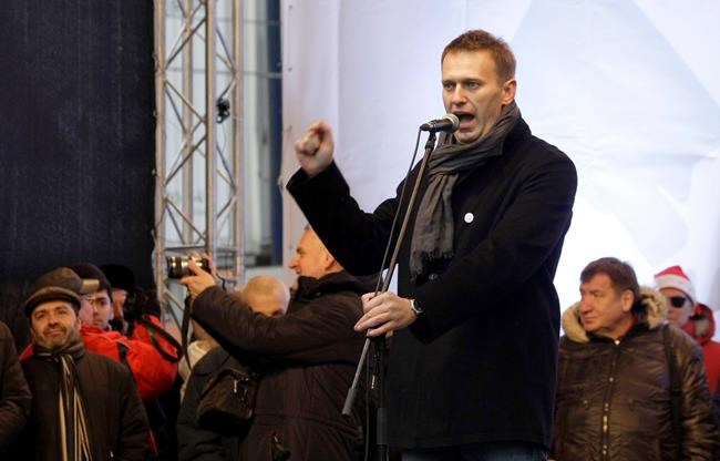 FILE - Opposition leader Alexei Navalny speaks during a rally to protest against alleged vote rigging in Russia's parliamentary elections in Moscow, Russia, on Dec. 24, 2011. A documentary film,