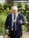British Prime Minister Boris Johnson visits Gandhi Ashram, the home of Indian freedom fighter Mahatma Gandhi, in Ahmedabad, India, Thursday, April 21, 2022. (AP Photo/Ajit Solanki)