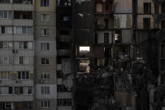 A building heavily damaged by multiple Russian bombardments stands near a frontline in Kharkiv, Ukraine, Monday, April 25, 2022. (AP Photo/Felipe Dana)
