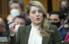 Foreign Affairs Minister Melanie Joly rises to respond to a question from the opposition during Question Period, in Ottawa, Thursday, April 28, 2022. THE CANADIAN PRESS/Adrian Wyld