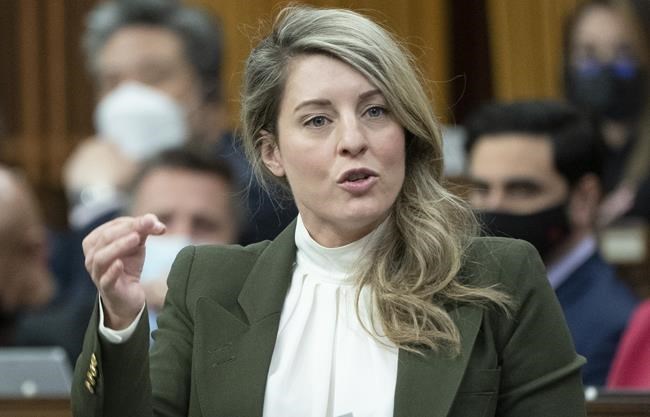 Foreign Affairs Minister Melanie Joly rises to respond to a question from the opposition during Question Period, in Ottawa, Thursday, April 28, 2022. THE CANADIAN PRESS/Adrian Wyld