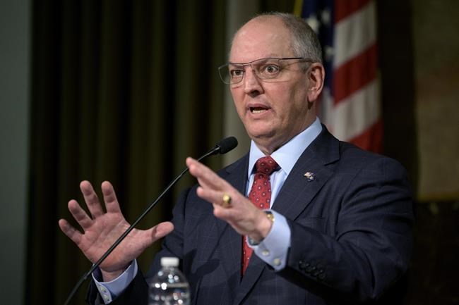 FILE - Louisiana Gov. John Bel Edwards speaks during a news conference in Baton Rouge, La., on Feb. 1, 2022. A bill scheduled for debate Thursday, May 12, 2022, in the Louisiana House would make women who get abortions subject to criminal prosecution and prison — a position that has drawn opposition from Louisiana’s anti-abortion governor and groups including Louisiana Right to Life and the Louisiana Conference of Catholic Bishops. “To suggest that a woman would be jailed for an abortion is simply absurd,” Edwards, a devout Catholic and a Democrat who has long broken with his party on the abortion issue said in a news release Wednesday, May 11. (AP Photo/Matthew Hinton, File)