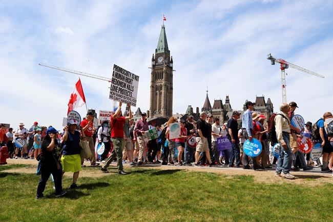 People take part in the March for Life on Parliament Hill in Ottawa on Thursday, May 12, 2022. THE CANADIAN PRESS/ Patrick Doyle