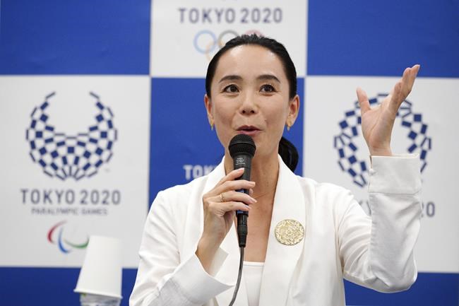 FILE - Japanese film director Naomi Kawase speaks during a press conference in Tokyo on Oct. 23, 2018. The documentary film produced by Kawase about the pandemic-delayed Tokyo Olympics premiered on Monday, May 23, 2022, shown to reporters and other invited guests in the Japanese capital. (AP Photo/Eugene Hoshiko, File)