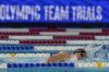 FILE - Katie Ledecky participates in the women's 800 freestyle during wave 2 of the U.S. Olympic Swim Trials on Saturday, June 19, 2021, in Omaha, Neb. USA Swimming has set the dates for the 2024 Olympic trials, which will be held at Lucas Oil Stadium in Indianapolis. The governing body announced Monday, May 23, 2022, that the competition to determine the team for the Paris Games will run from June 15-23. (AP Photo/Jeff Roberson, File)