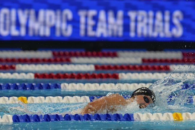 FILE - Katie Ledecky participates in the women's 800 freestyle during wave 2 of the U.S. Olympic Swim Trials on Saturday, June 19, 2021, in Omaha, Neb. USA Swimming has set the dates for the 2024 Olympic trials, which will be held at Lucas Oil Stadium in Indianapolis. The governing body announced Monday, May 23, 2022, that the competition to determine the team for the Paris Games will run from June 15-23. (AP Photo/Jeff Roberson, File)