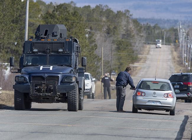 Police block the highway in Debert, N.S., on Sunday, April 19, 2020. The RCMP have taken Gabriel Wortman, 51, into custody after an incident in Portapique, N.S., where several people were shot. A report on how the RCMP handled the first scene of the 2020 Nova Scotia mass shooting indicates five of the victims weren’t found until about 18 hours after the killer fled. THE CANADIAN PRESS/Andrew Vaughan