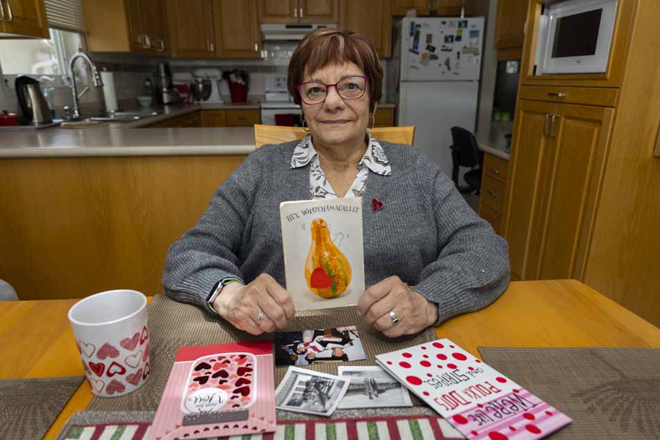 Brandonite Carol Enns holds a Valentine’s Day card she has been mailing back and forth with her friend Chris Ranick for 60 years. (Chelsea Kemp / The Brandon Sun)
