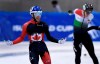 Canada's Steven Dubois celebrates as he crosses the finish line of the men's 500 meters race at the World Cup short track speed skating championship in Dresden, eastern Germany, Sunday, Feb. 9, 2020. (AP Photo/Jens Meyer)