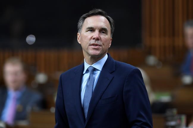 Finance Minister Bill Morneau delivers the government's fiscal snapshot in the House of Commons in Ottawa on Wednesday, July 8, 2020. THE CANADIAN PRESS/Adrian Wyld
