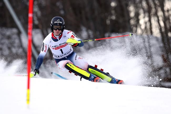 France's Clement Noel competes during the first run of an alpine ski, men's World Cup slalom, in Chamonix, France, Saturday, Feb. 8, 2020. (AP Photo/Alessandro Trovati)
