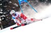 Switzerland's Michelle Gisin speeds down the course of an alpine ski, women's World Cup giant slalom, in Kranjska Gora, Slovenia, Sunday, Jan. 17, 2021. (AP Photo/ Giovanni Auletta)