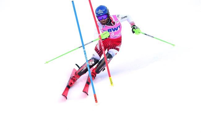 Austria's Marco Schwarz competes during the first run of an alpine ski, men's World Cup slalom in Wengen, Switzerland, Sunday, Jan. 19, 2020. (AP Photo/Marco Tacca)