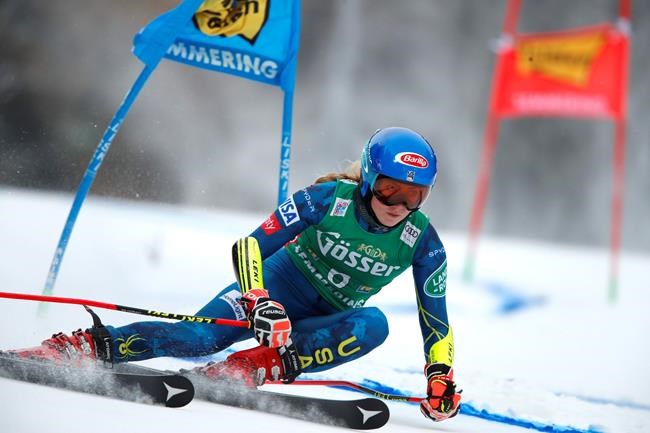 United States' Mikaela Shiffrin speeds down the course during an alpine ski, women's World Cup giant slalom, in Semmering, Austria, Monday, Dec. 28, 2020. (AP Photo/Gabriele Facciotti)