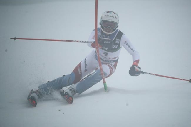 Switzerland's Michelle Gisin speeds down the course during an alpine ski, women's World Cup Slalom, in Zagreb, Croatia, Sunday, Jan. 3, 2021. (AP Photo/Marco Trovati)