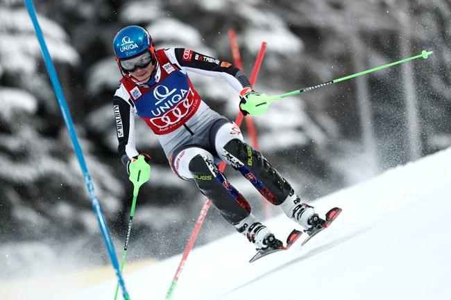 Slovakia's Petra Vlhova speeds down the course during an alpine ski, women's World Cup slalom, in Semmering, Austria, Tuesday, Dec. 29, 2020. (AP Photo/Gabriele Facciotti)